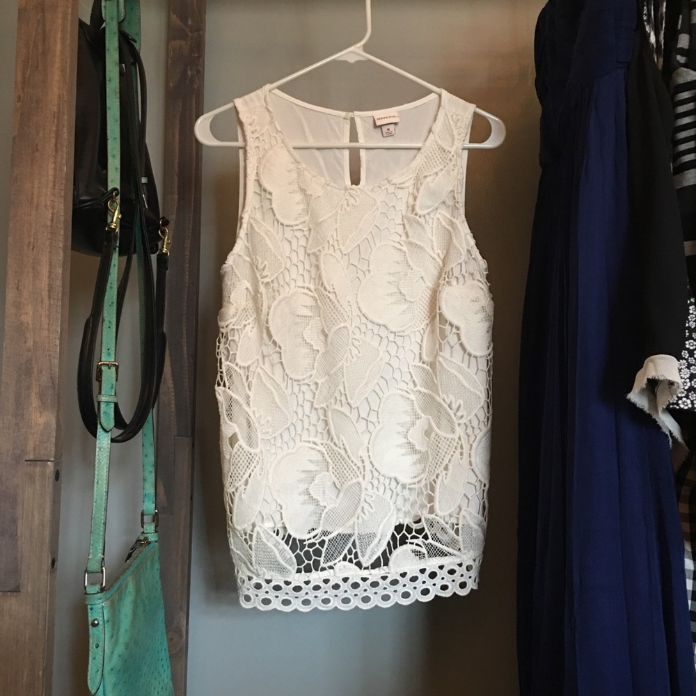 White embroidered tank top.